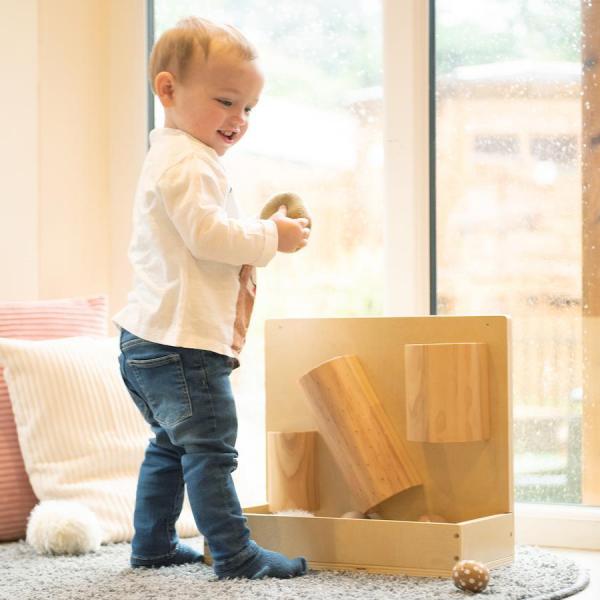 Planche d'activités en bois - boules texturées