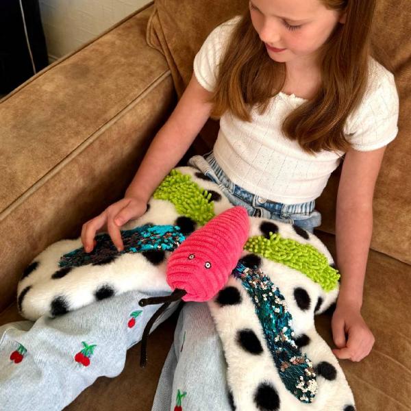 Papillon tactile lesté avec paillettes